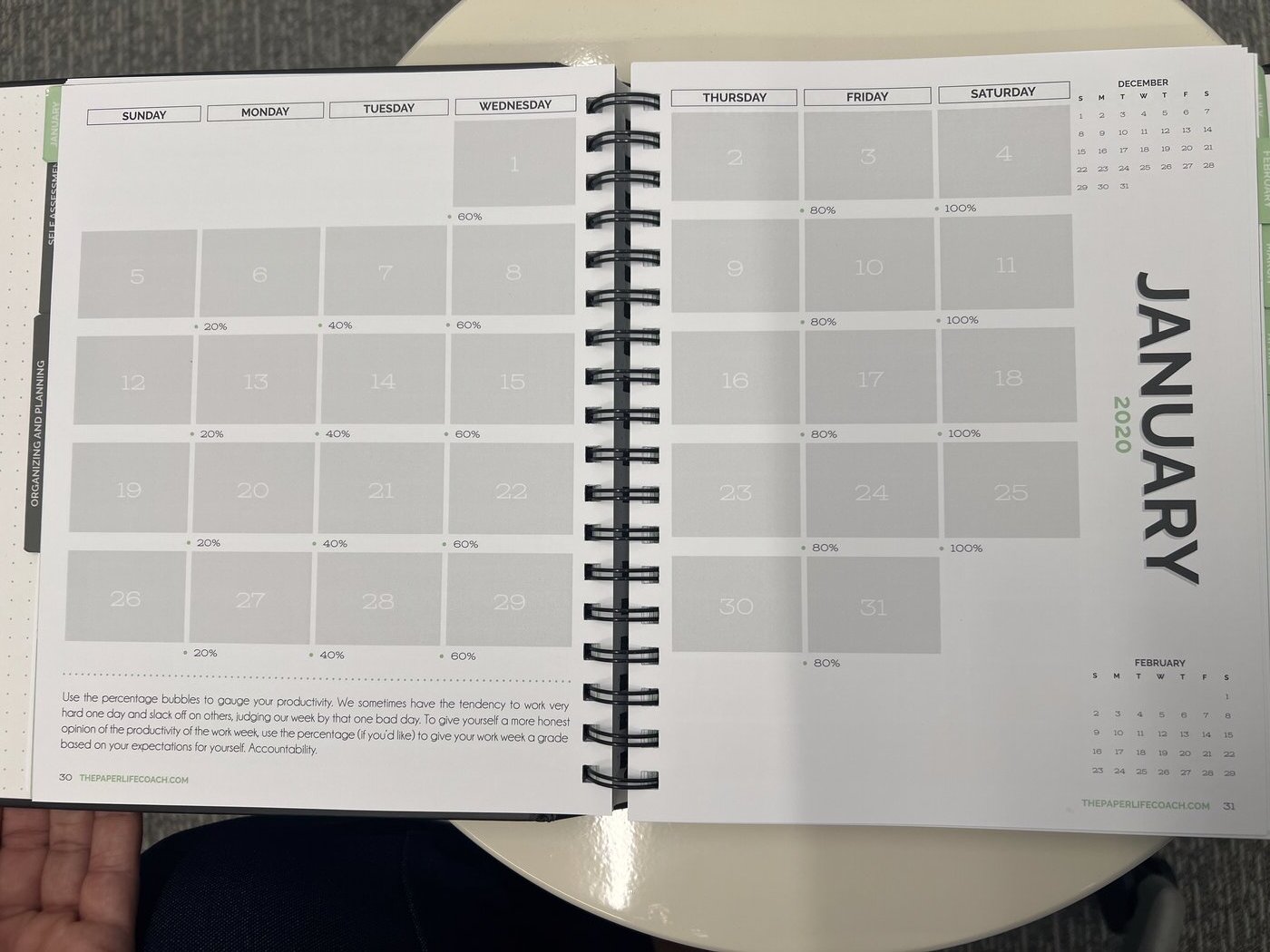 Monthly calendar spread inside The Paper Life Coach